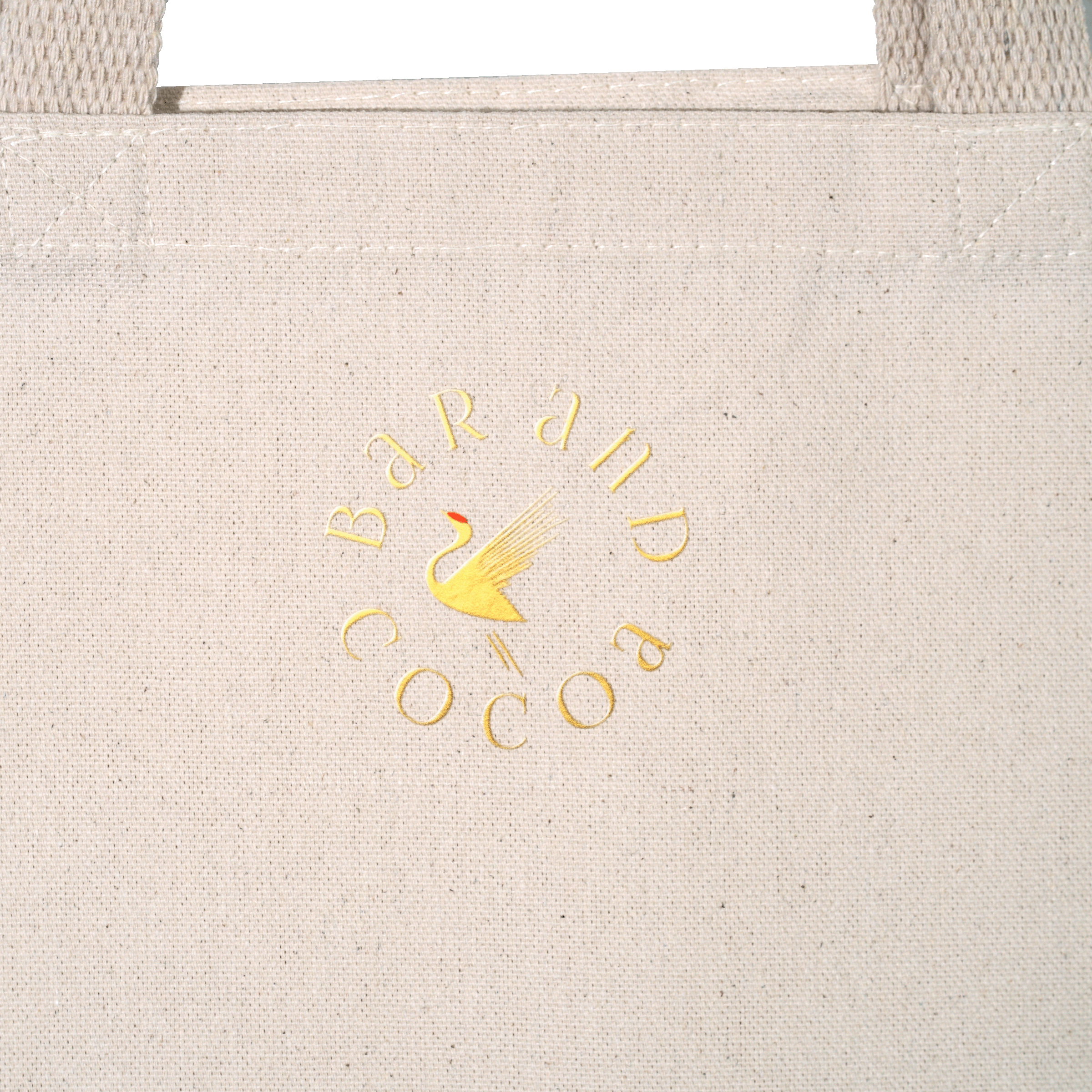 Beige canvas eco tote bag with gold foil Bar and Cocoa crane logo
