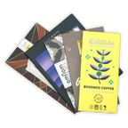 Bright yellow Latitude craft coffee chocolate bar with teal purple plant design