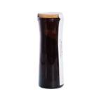 Angled view of the dark amber Hojicha Hot Chocolate Mix jar with a cork lid and white wraparound label.