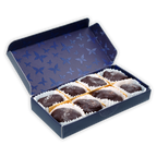 Definite 100% dark chocolate covered dates with macadamia in navy box