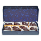 Definite 100% dark chocolate covered dates with macadamia in blue butterfly box