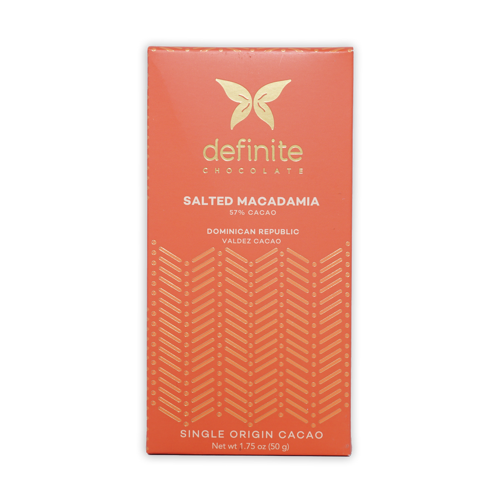 Definite Cashew Milk Chocolate w/ Macadamia 57% coral wrapper with gold butterfly