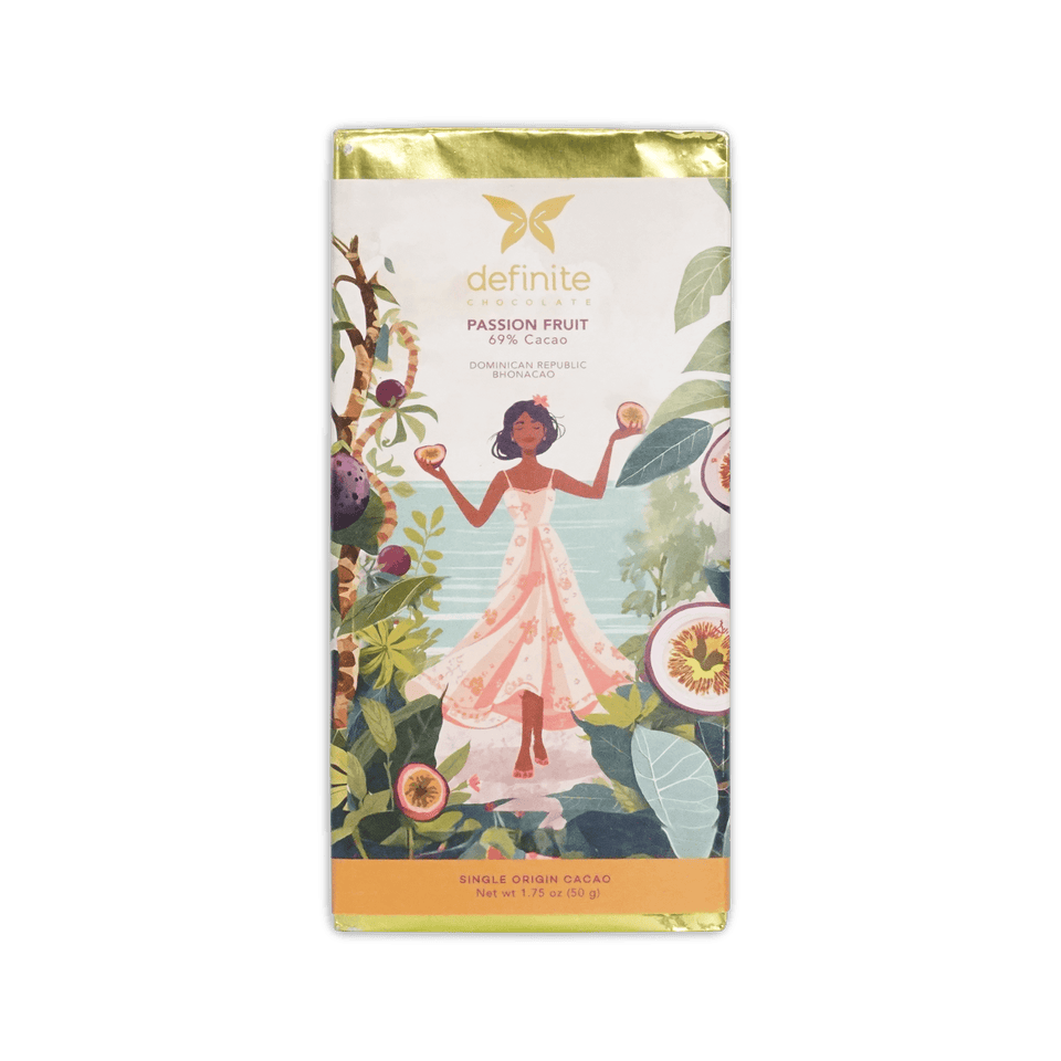 Definite Chocolate Passion Fruit bar wrapper with an illustration of a woman in a garden holding fruit, reading 69% Cacao, Dominican Republic Bhonacao.