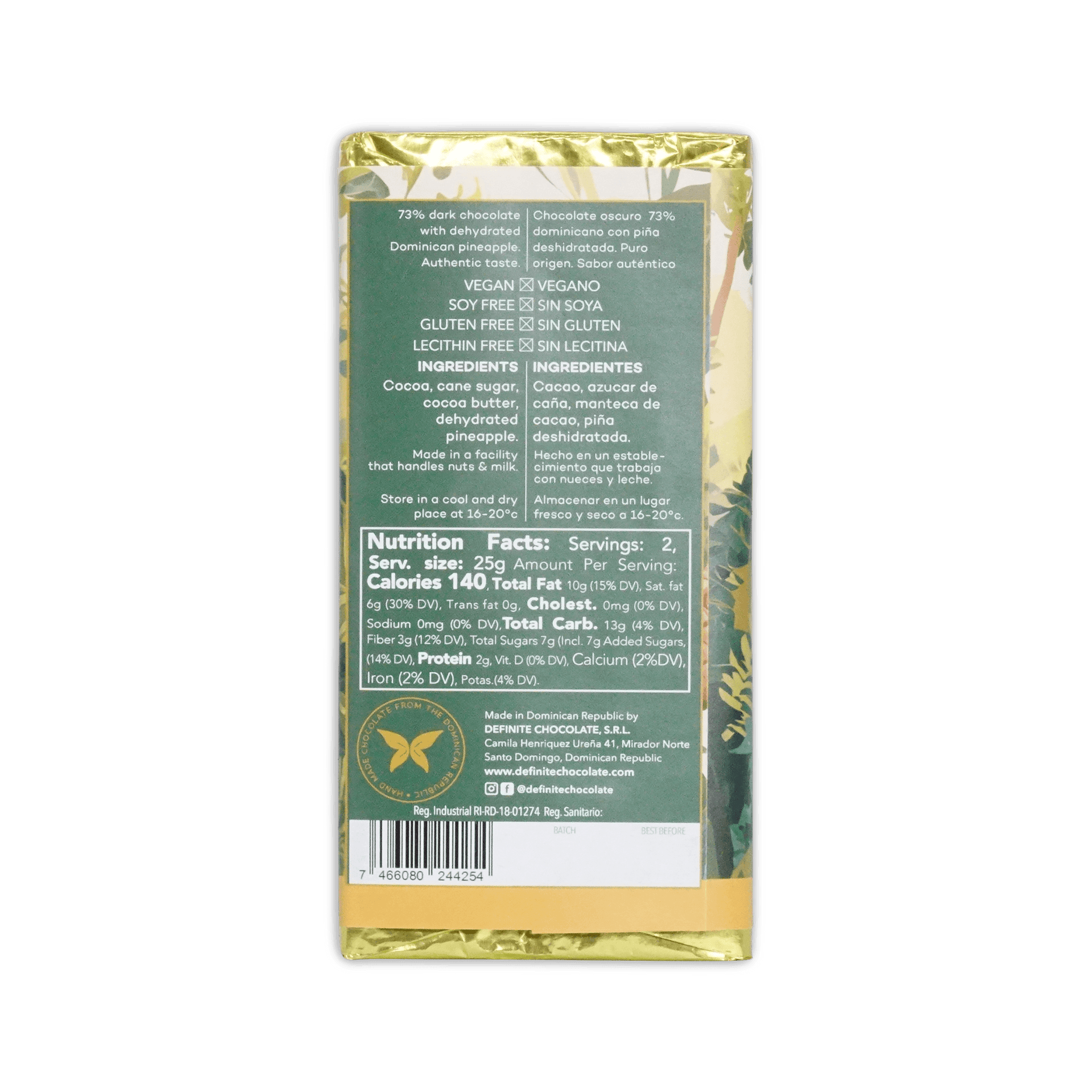 Back of Definite Pineapple wrapper, green panel with 73% dark chocolate description, vegan and gluten-free marks, ingredients and barcode