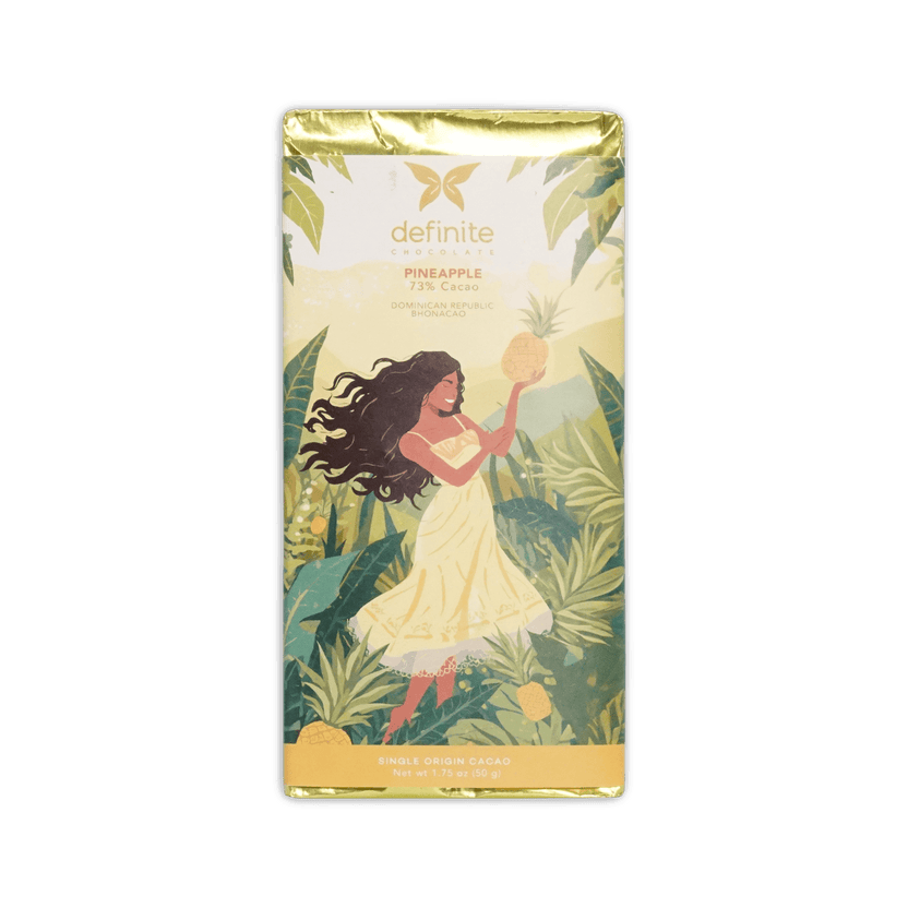 Definite Chocolate Pineapple bar, illustration of a woman holding a pineapple in tropical foliage, 73% cacao, Dominican Republic, 50 g