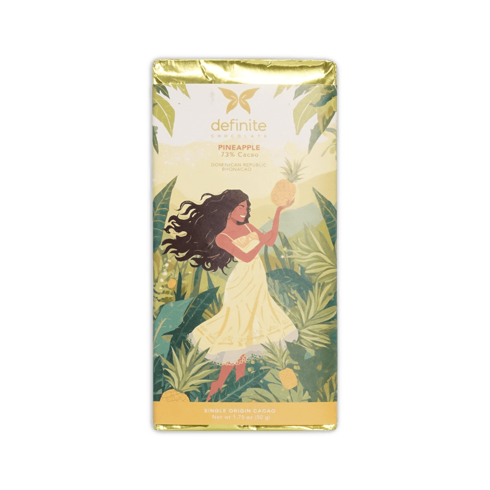Definite Chocolate Pineapple bar, illustration of a woman holding a pineapple in tropical foliage, 73% cacao, Dominican Republic, 50 g