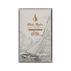 Dick Taylor Craft Chocolate 73% Dark with Brown Butter, Nibs and Sea Salt bar in cream box with a sailboat illustration, 57g.