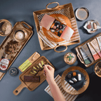 Dinner Party Hero chocolate bundle styled on gold trays for sharing
