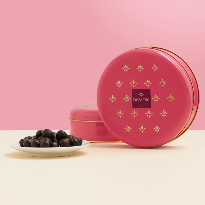Domori pink tin with gold stars, dark chocolate Amarena cherries gift box