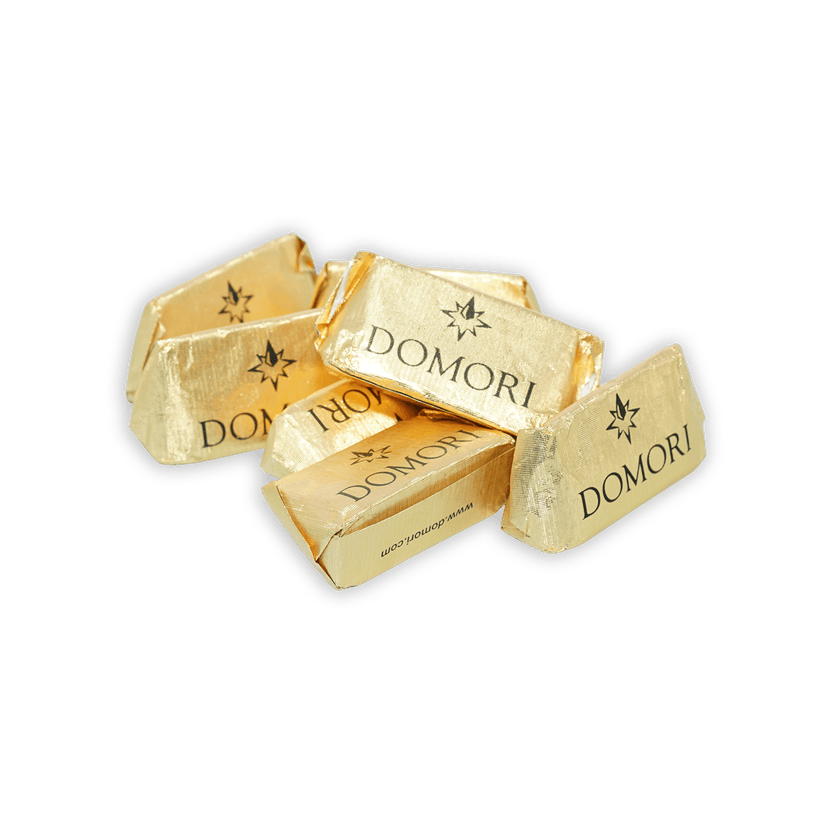 Gold-wrapped Domori Classic Giandujotti Bag with shiny foil and black star logo