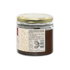 Domori Crema Gianduja Spread in clear glass jar with gold lid