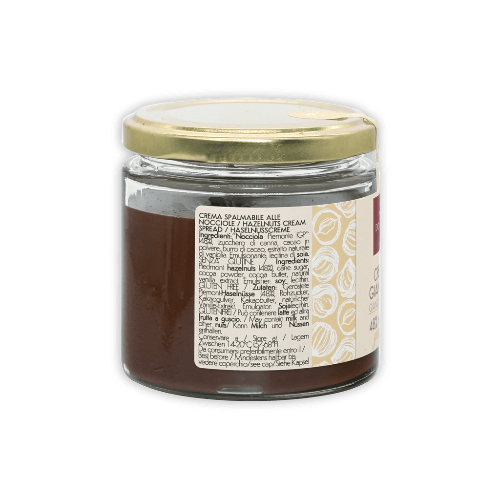 Domori Crema Gianduja Spread jar with gold lid and dark brown hazelnut cream