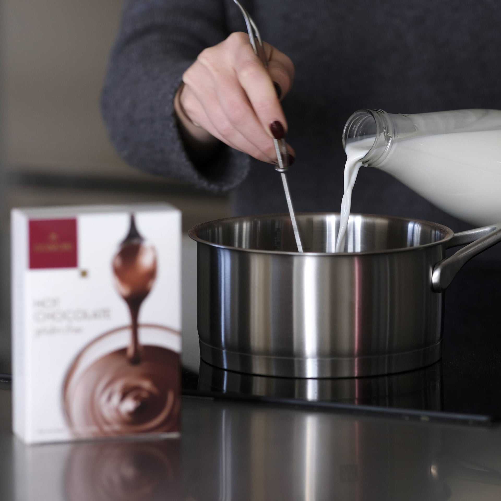 Shiny stainless steel saucepan with handle for Domori Hot Chocolate Mix