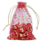 Pink sheer organza bag with gold hearts holding Domori Criollo Hearts 70% candies