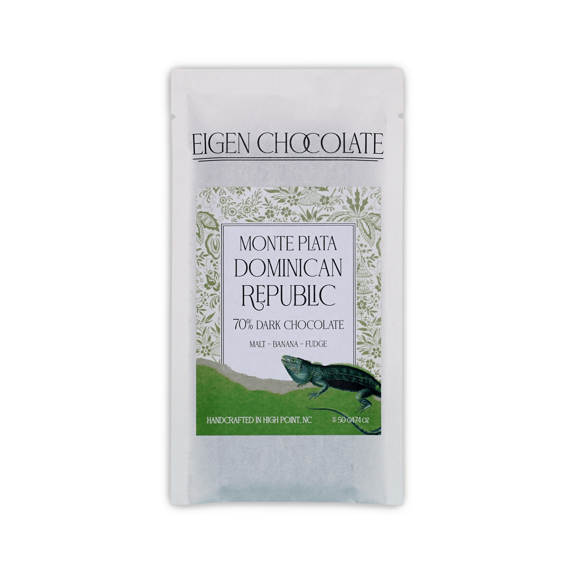 Eigen Chocolate pouch with a green iguana and floral pattern, reading Monte Plata Dominican Republic, 70% Dark Chocolate, 50 g.