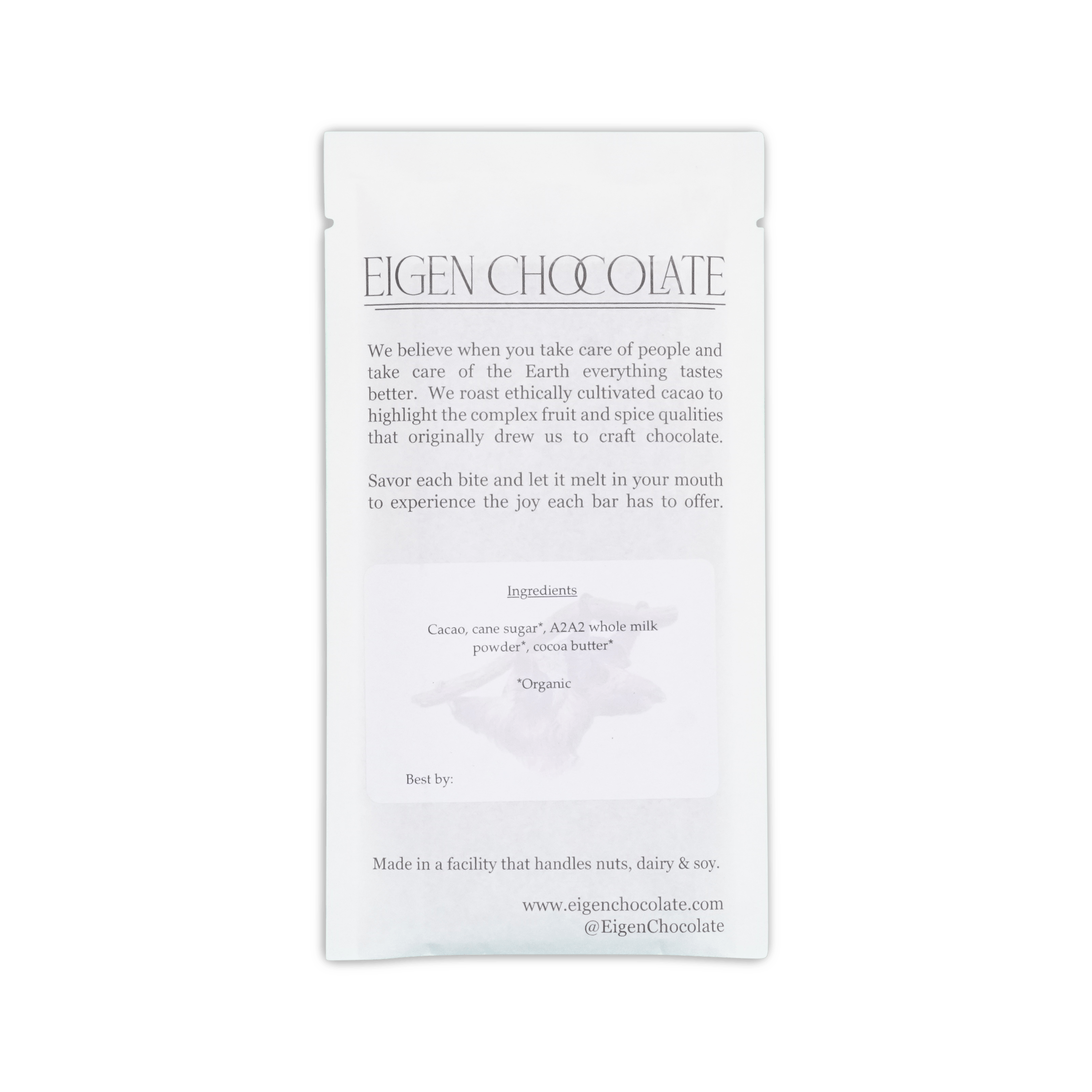 Back of Eigen Chocolate white pouch, brand text about ethically cultivated cacao, ingredients list