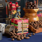 Executive Desk chocolates with Pralus Pyramide, gianduja and chocolate-coated almonds spilling from a tube