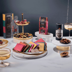Executive Desk shareable chocolates displayed on marble and gold stands