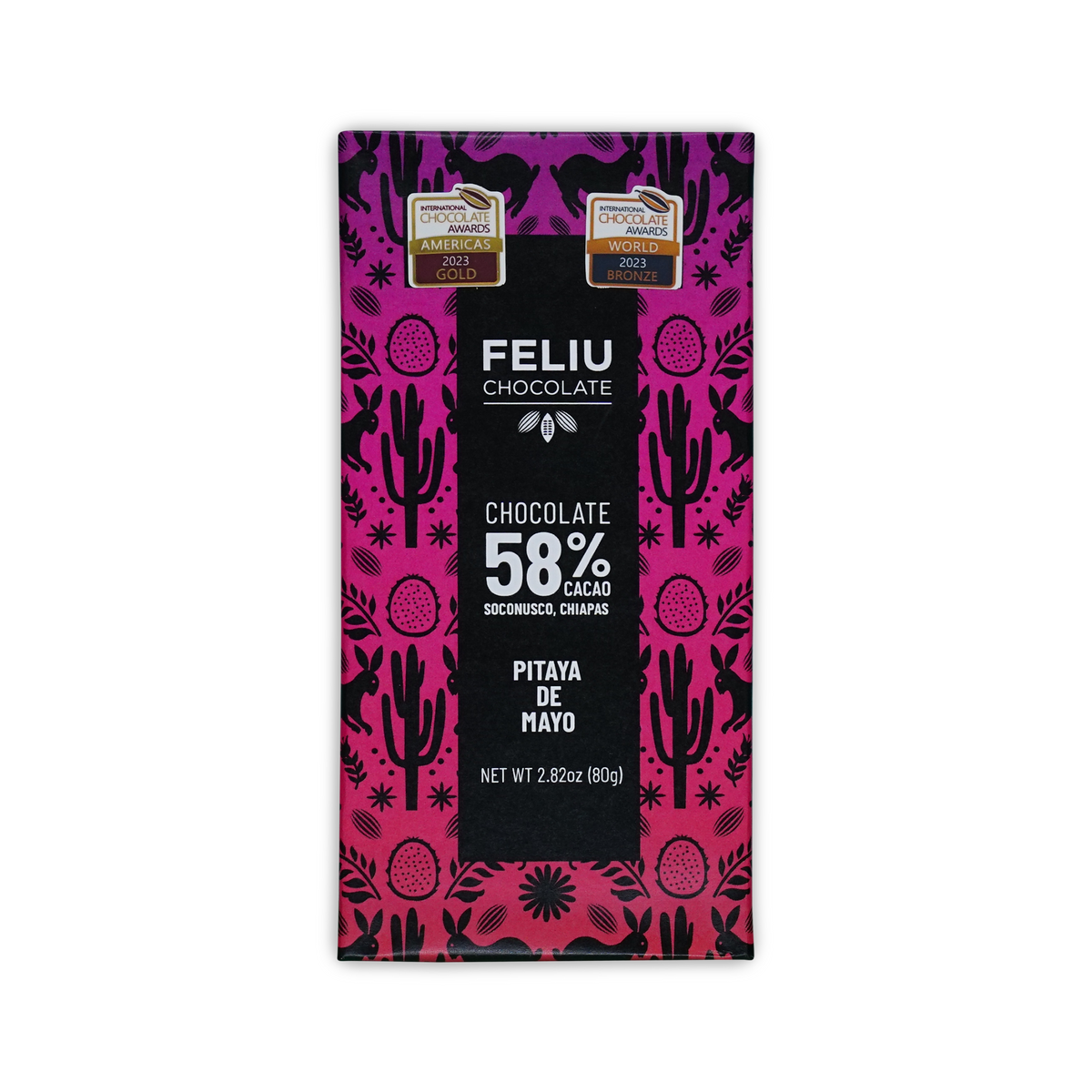 A pink Feliu Chocolate 58% Cacao Pitaya De Mayo bar wrapper with black cactus and rabbit designs on a black background.