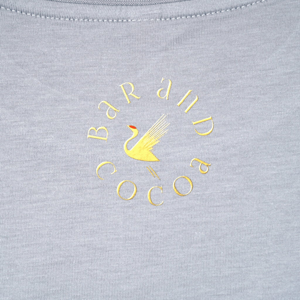 Gray Find Your Inner Piece Tee with gold bar and cocoa swan logo