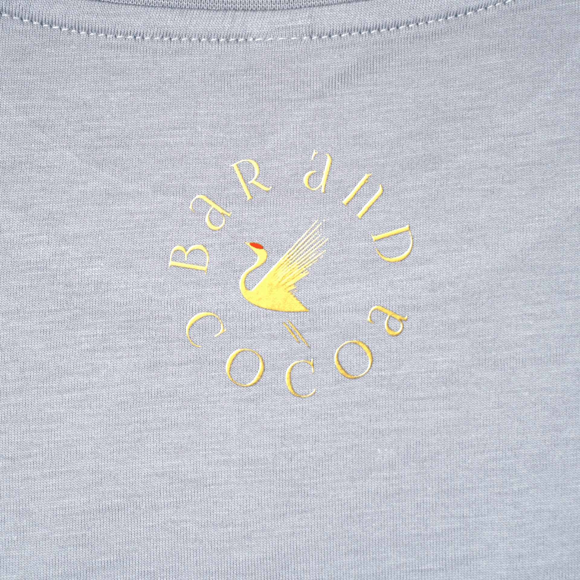 Gray Find Your Inner Piece Tee with gold bar and cocoa swan logo