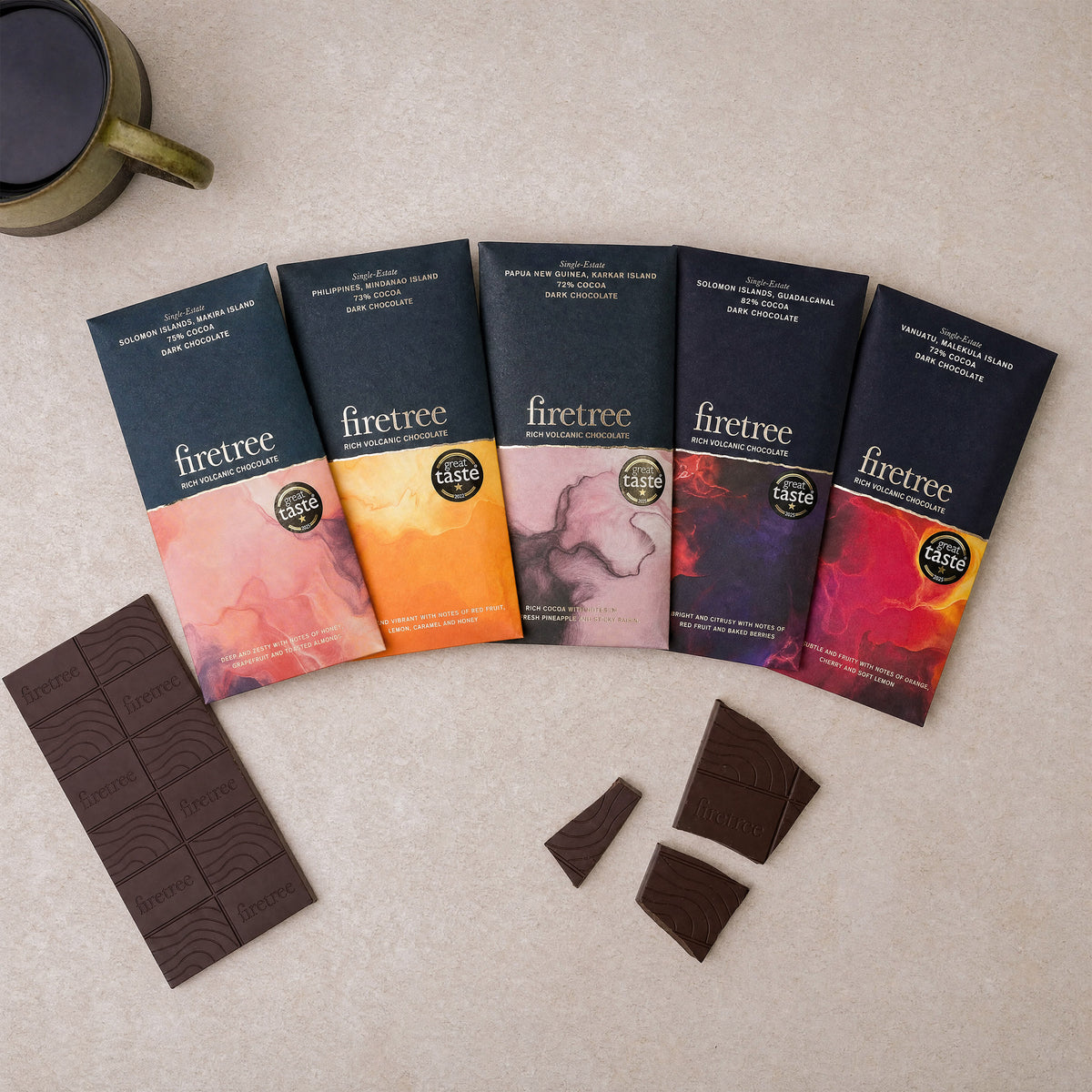 Five Firetree bars with broken chocolate pieces.