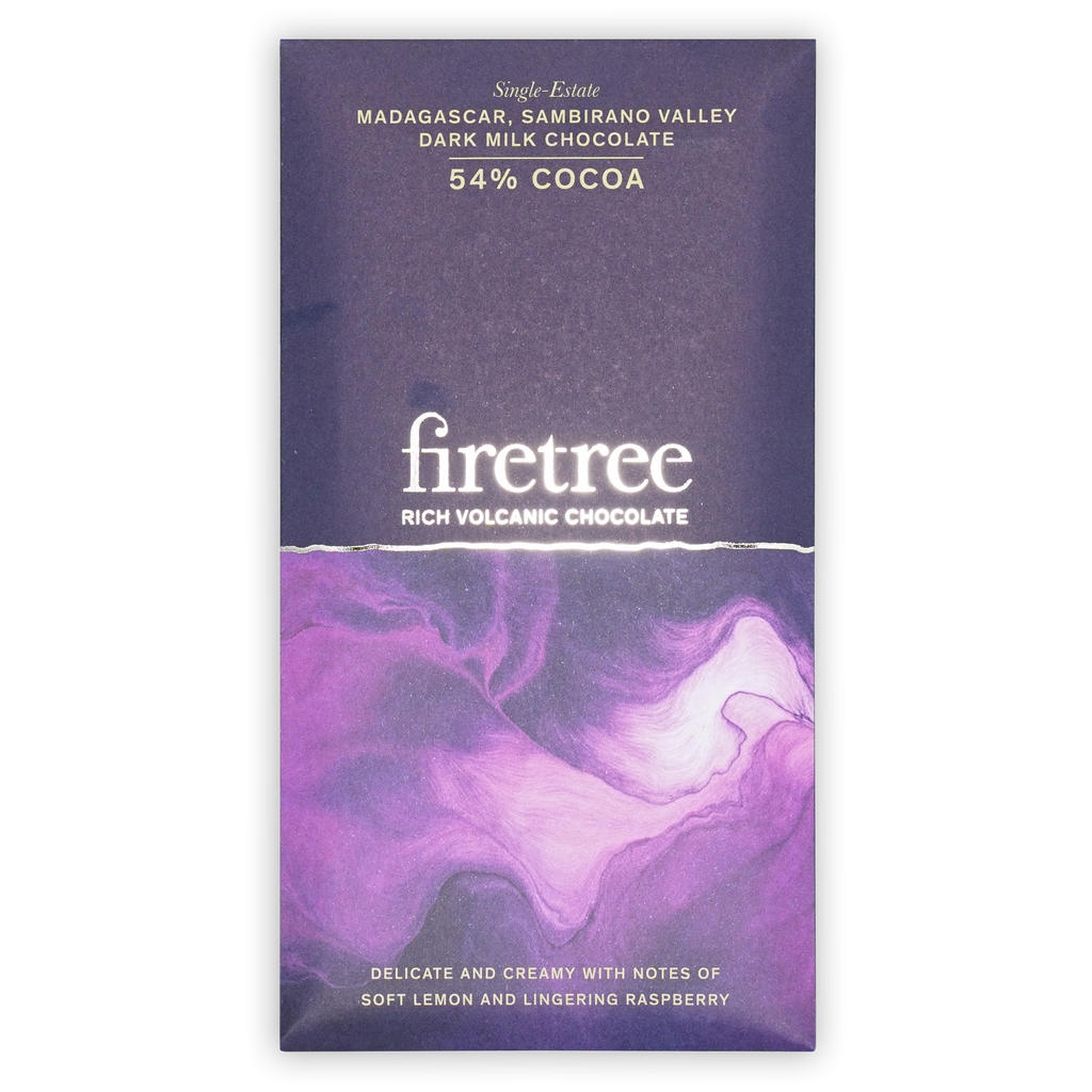 A purple Firetree Madagascar 54% dark milk chocolate bar box with a marbled design on a black background.