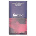 A purple and pink Firetree 90% cocoa dark chocolate bar wrapper reading Tanzania, Kilombero Valley on a black background.