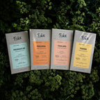 Four Fjåk bars on fresh greenery.