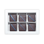 Six Fjåk dark chocolate salted caramels with blue icing in white box