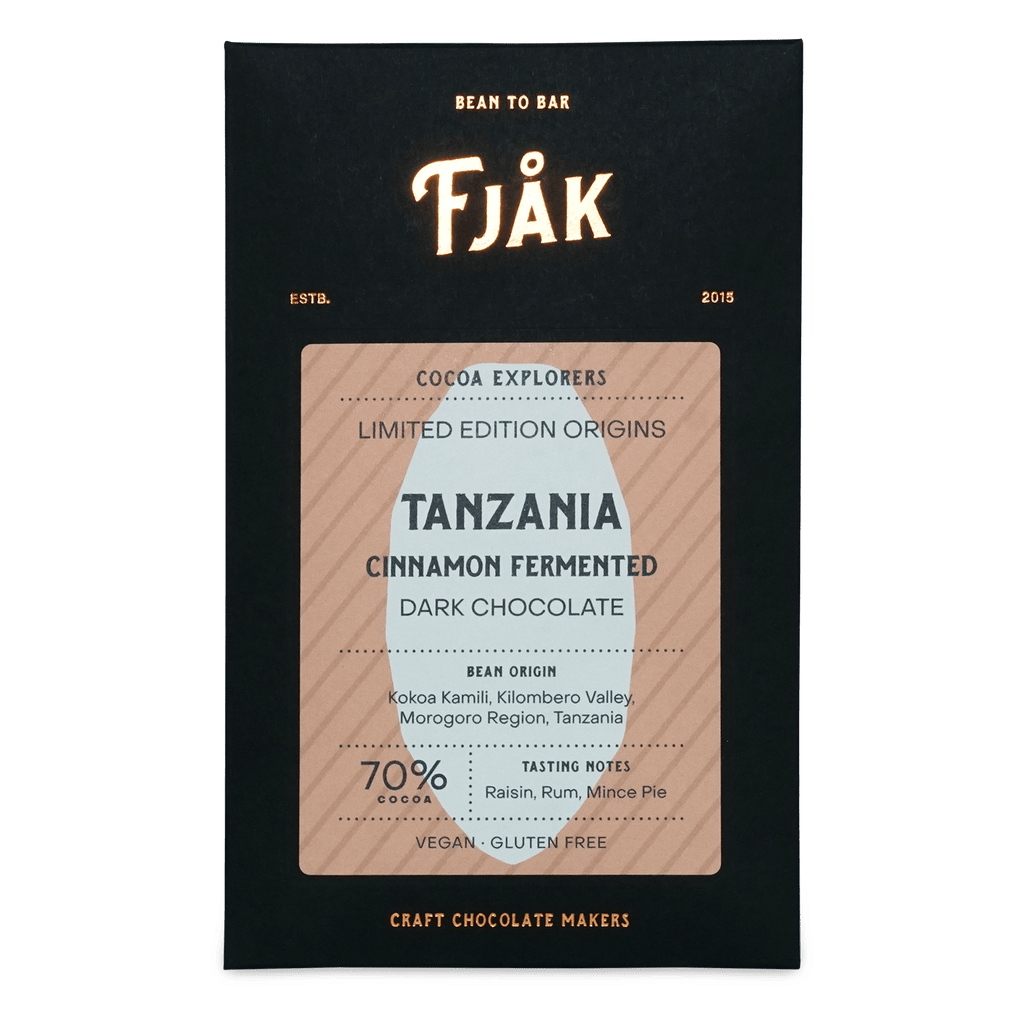 Fjåk cinnamon fermented Tanzania microlot 70% dark chocolate bar in sleek black and beige packaging explorer series