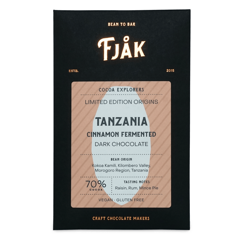 Fjåk cinnamon fermented Tanzania microlot 70% dark chocolate bar in sleek black and beige packaging explorer series