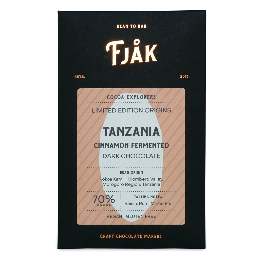 Fjåk cinnamon fermented Tanzania microlot 70% dark chocolate bar in sleek black and beige packaging explorer series