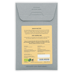 Fjåk Uganda Dark Chocolate 100% in gray textured paper wrapper with yellow organic label