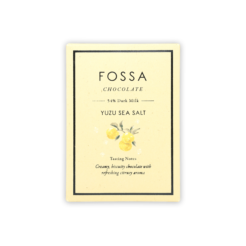 Fossa 54% dark milk yuzu sea salt bar in cream wrapper with yuzu art