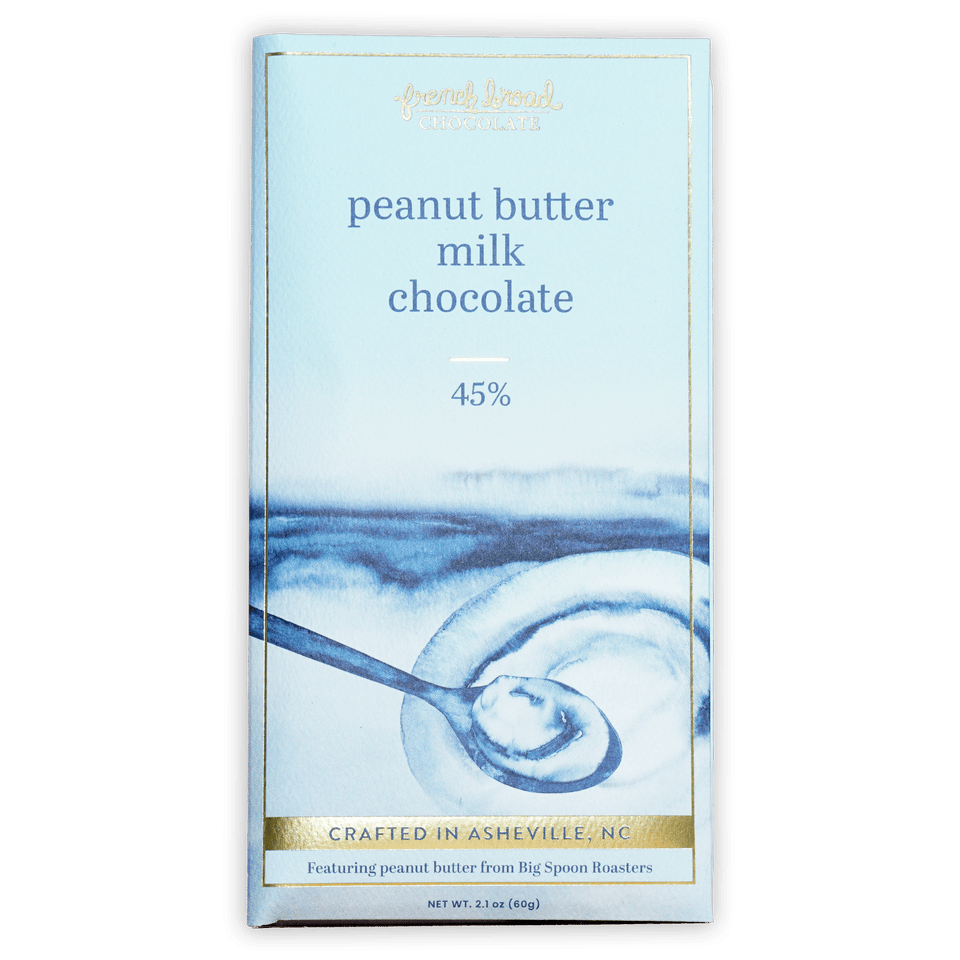 French Broad Milk Chocolate w/ Peanut Butter 45% bar, light blue gold wrap, watercolor peanut butter spoon