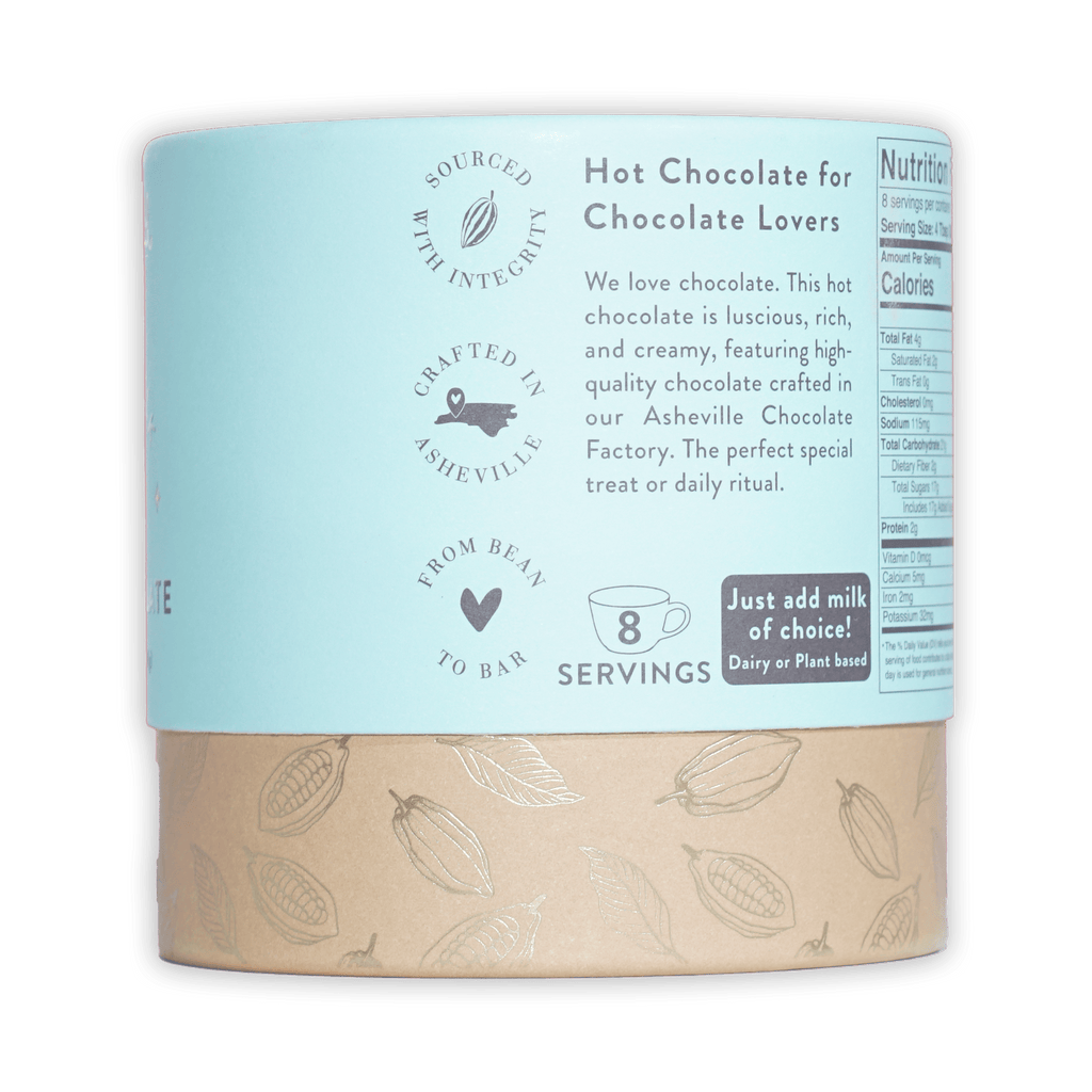 French Broad Milk Hot Chocolate Mix light blue cylindrical can with cocoa pod band