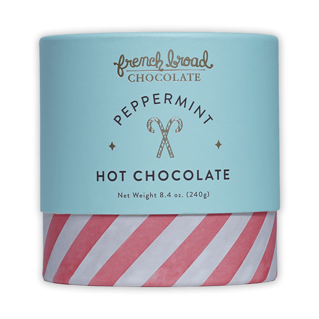 French Broad Peppermint Hot Chocolate in light blue striped canister