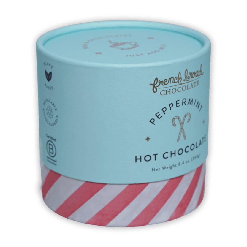 French Broad peppermint hot chocolate in mint green red-striped cylinder