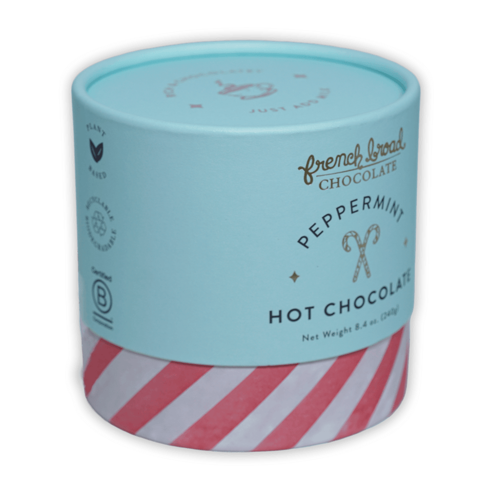 French Broad peppermint hot chocolate in mint green red-striped cylinder