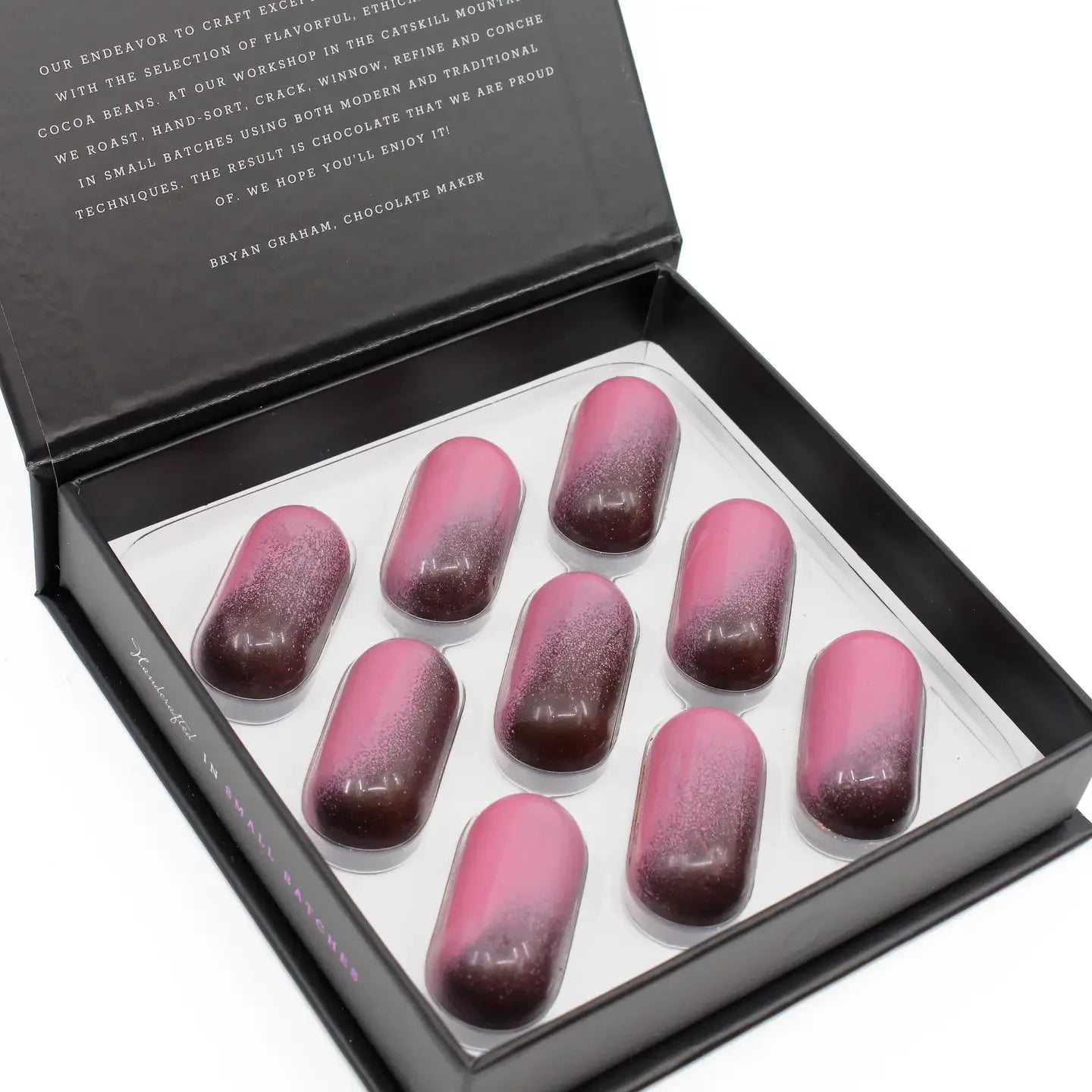 Fruition passion fruit caramels: pink-to-brown truffles in black gift box