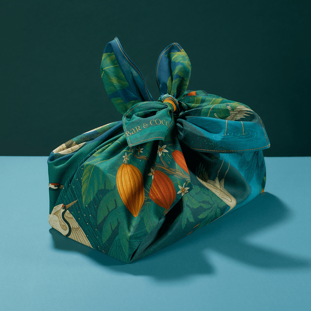 Chocolate bundle wrapped in Bar & Cocoa cacao pod and crane print furoshiki, tied in a knot on top