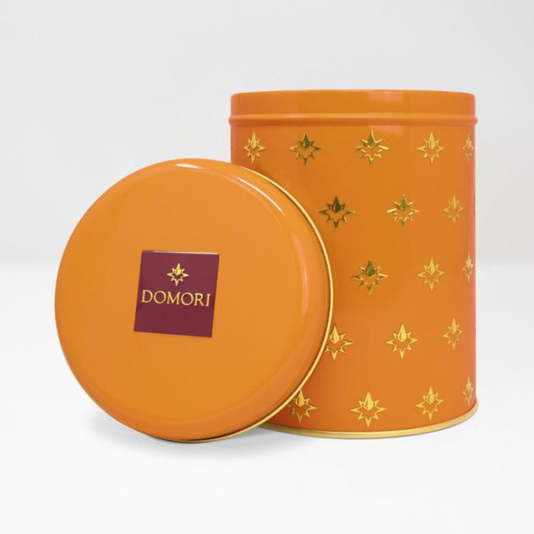 Domori Giandujotti & dark truffles tin with gold stars and logo lid
