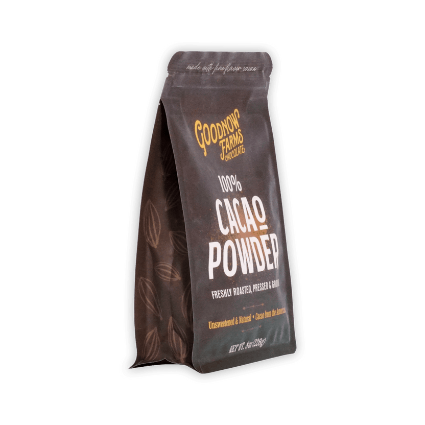 Goodnow Farms 100% Cacao Powder pouch at an angle, brown resealable bag with cacao pod illustrations, 8oz