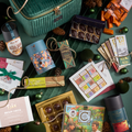 Grand Chocolate Voyage Luxury Gift: vibrant chocolates in colorful wrappers with velvet travel box