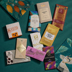Grand Gesture milk chocolate gift bundle, craft bars and boxes on printed fabric wraps.
