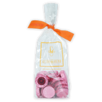Clear plastic bag of Guido Gobino berry-filled chocolate discs tied with orange ribbon