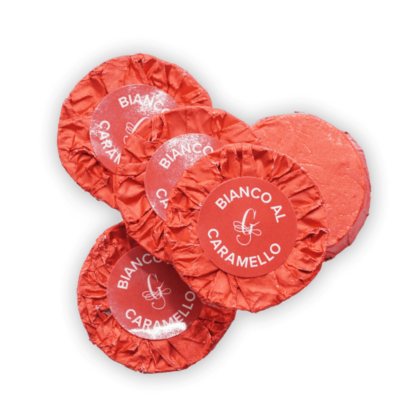 Guido Gobino red fabric-wrapped caramels in bianco al caramello packages