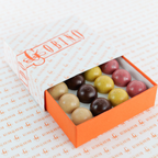 Guido Gobino Fruit & Spice Semisphere 32pc truffles in orange box