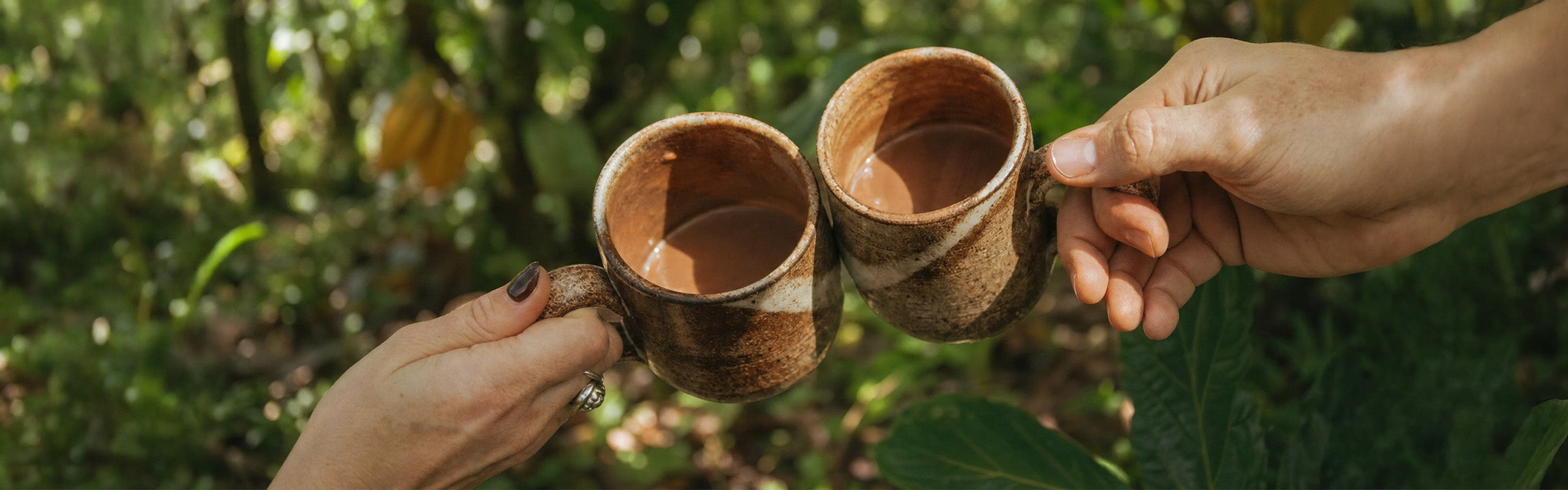 AI-generated illustration of two hands holding mugs of hot cocoa outdoors, surrounded by wildflowers and firewood